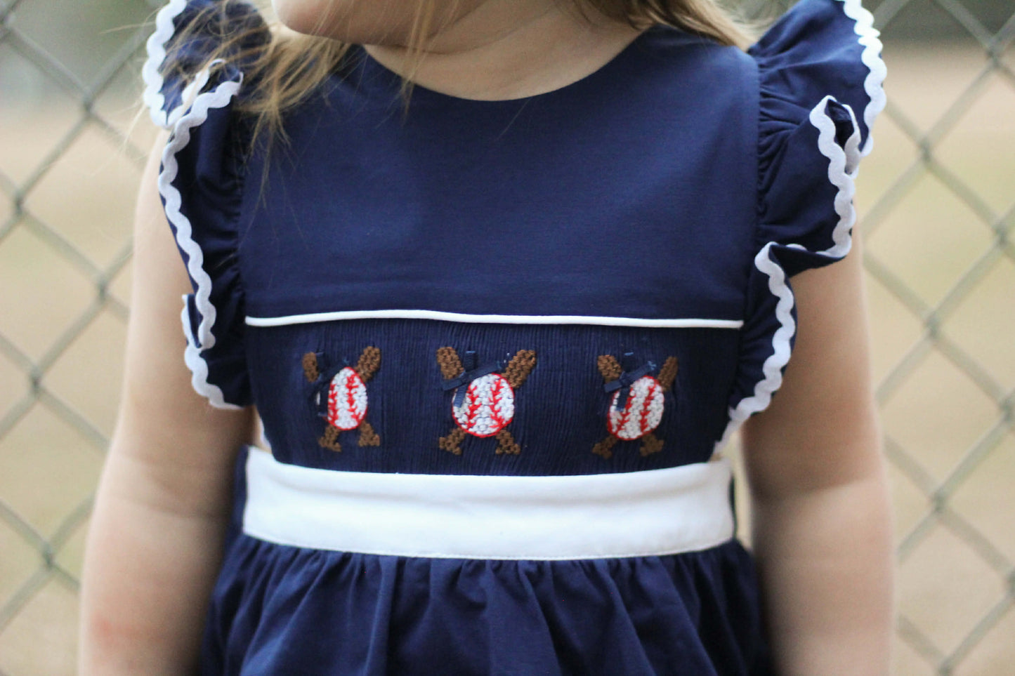 Girl’s Navy Smocked Baseball Bubble
