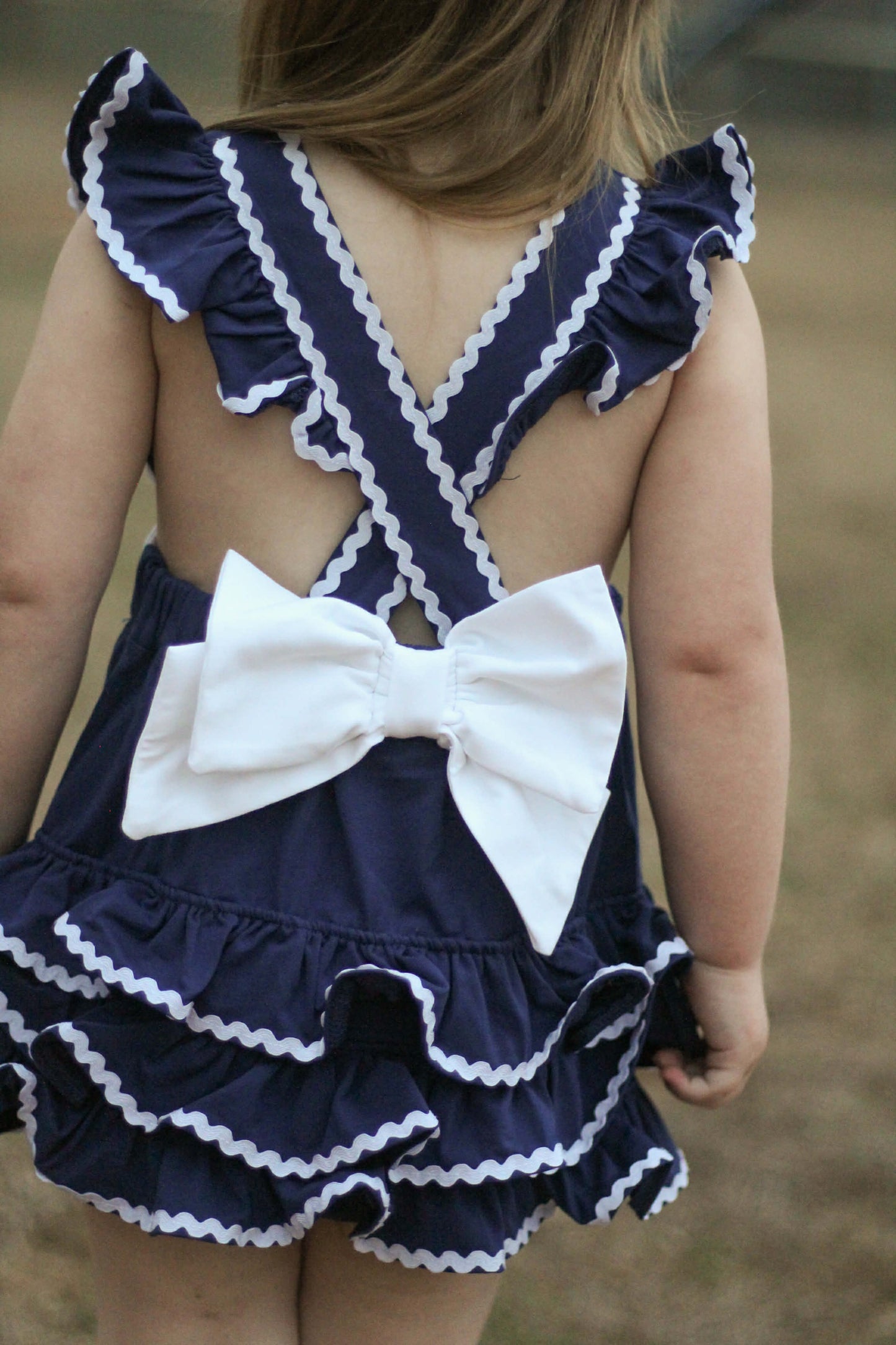 Girl’s Navy Smocked Baseball Bubble