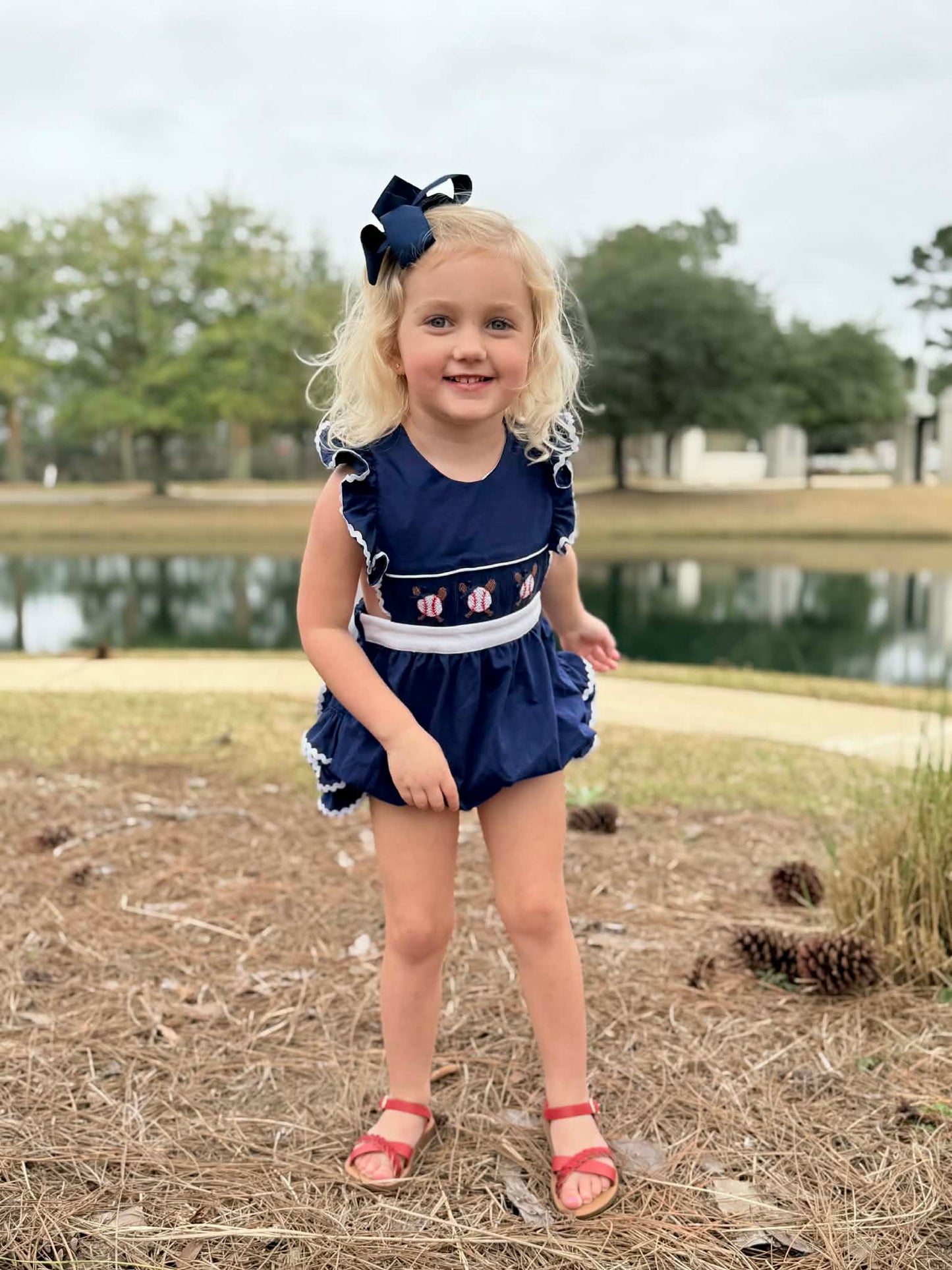 Girl’s Navy Smocked Baseball Bubble