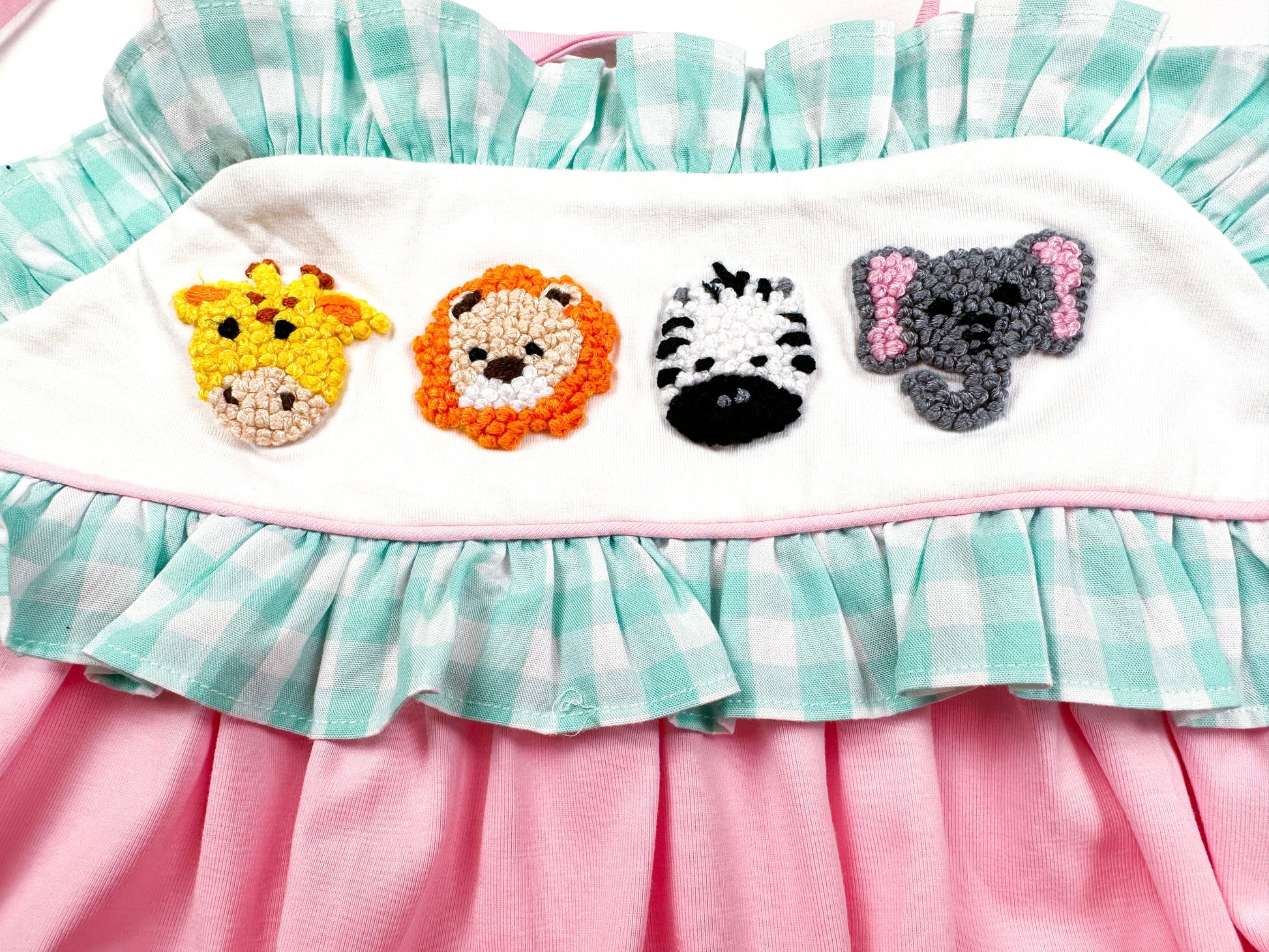 french knot dress with zoo characters